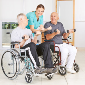 senior men doing an exercise with a caregiver